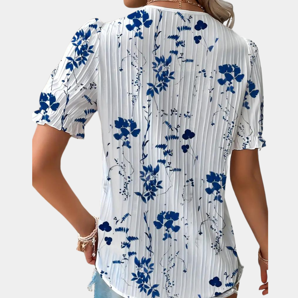 Zuzanna - Luchtige gebloemde damesblouse met kanten rand voor de zomer