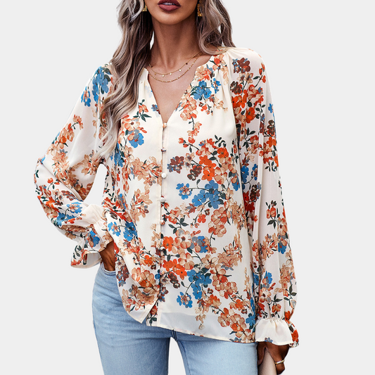 Elegante zomerse gebloemde damesblouse