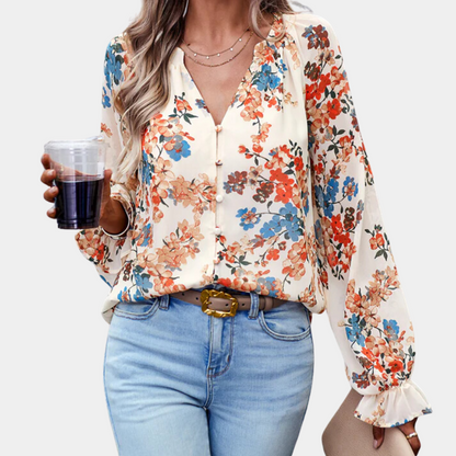 Elegante zomerse gebloemde damesblouse