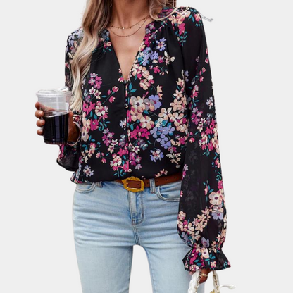 Elegante zomerse gebloemde damesblouse