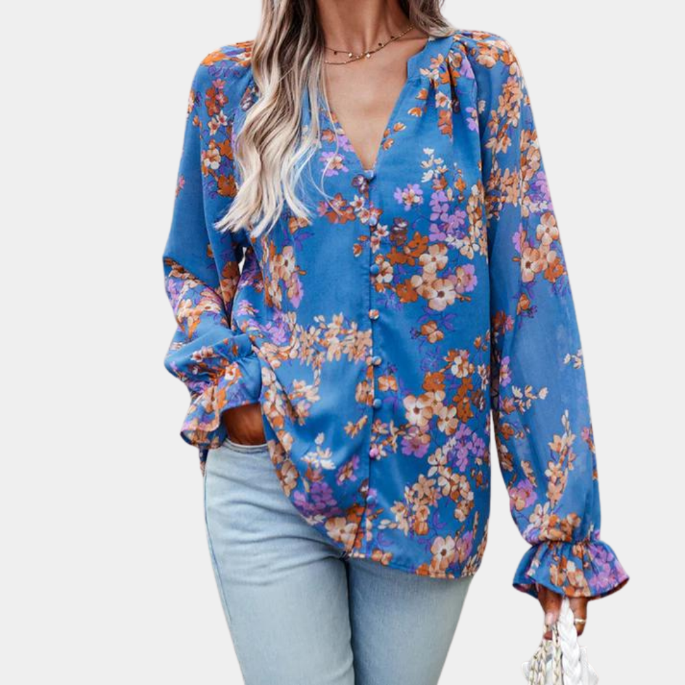Elegante zomerse gebloemde damesblouse