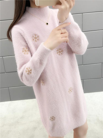 Chique gebreide sweaterjurk met lange mouwen en geborduurde details