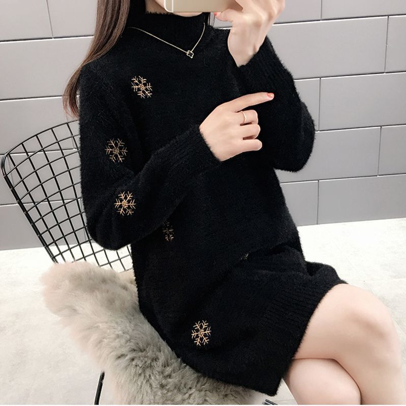 Chique gebreide sweaterjurk met lange mouwen en geborduurde details