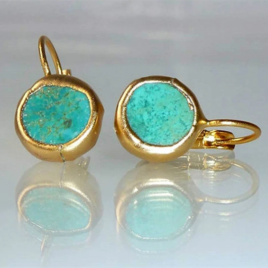 Gouden oorbellen met turquoise steen